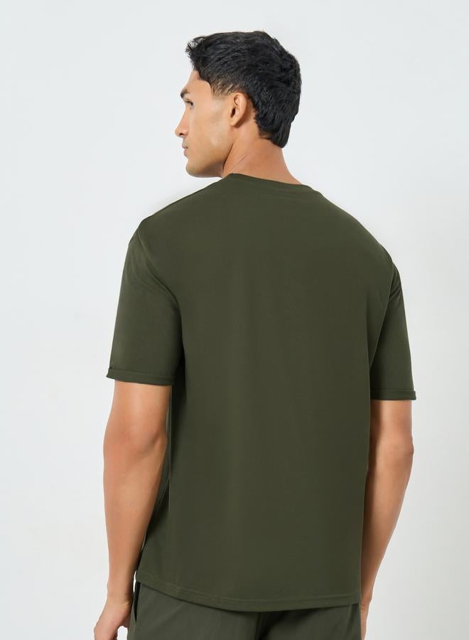 Styli Men Olive Green Slogan Print Oversized T-Shirt - Image 4